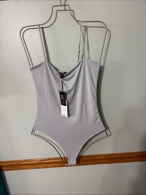 Express Body Contour Square Neck Bodysuit Suit. Mint colored Size: Small. NWT